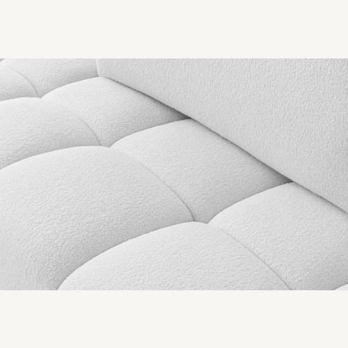 Fumo Komfortowa sofa narożna pikowana Tkanina Coral 70
